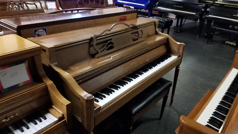 Janssen upright outlet piano