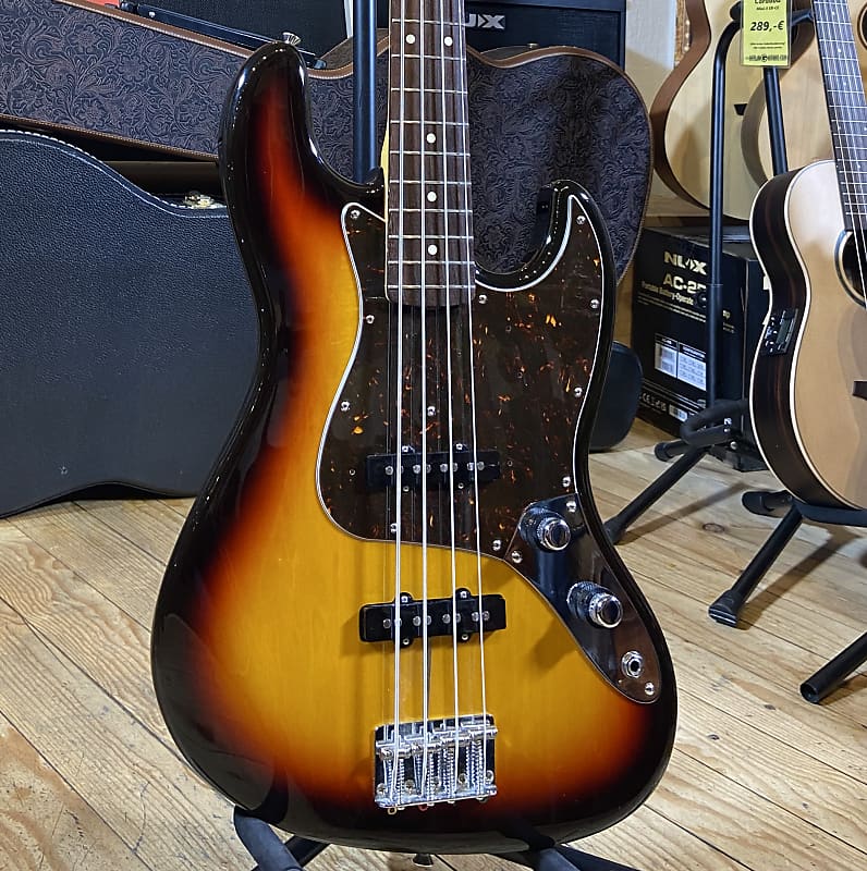 Jazz bass best sale sunburst tortoise
