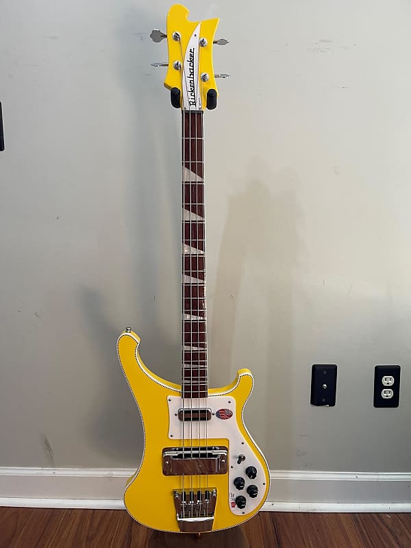 Yellow shop rickenbacker bass