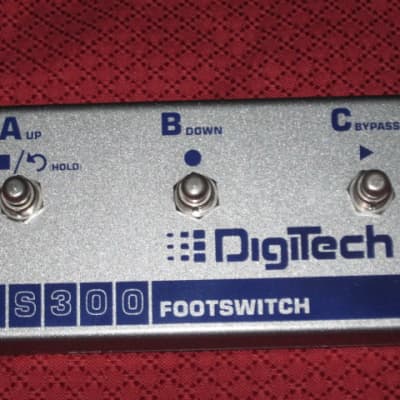 lightly used (mostly areas are A+ or near A+ except bottom side) DigiTech FS300 Footswitch  (Silver Casing with Blue Graphic) NO box / NO paperwork (NOTE: you need a TRS STEREO Cable - NOT included -  for this footswitch to work) for sale