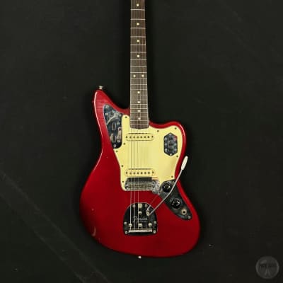 Fender Jaguar from 1964 in candy apple red finish with original case for sale