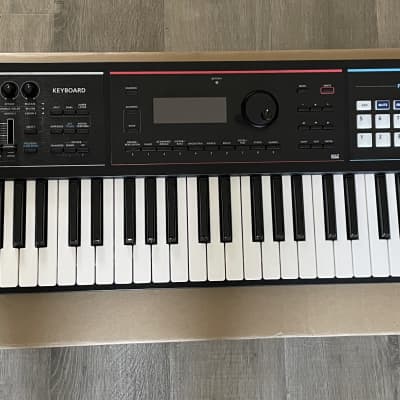 Roland Juno DS61 Synthesizer + extra sound thumb drive