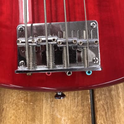 Peavey Milestone IV Fretless Bass Guitar - Transpartent Red image 5