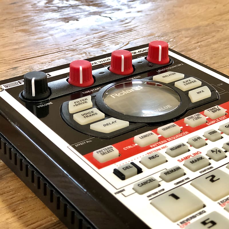 Roland SP-404SX with 303 vinyl skin and fat knobs | Reverb