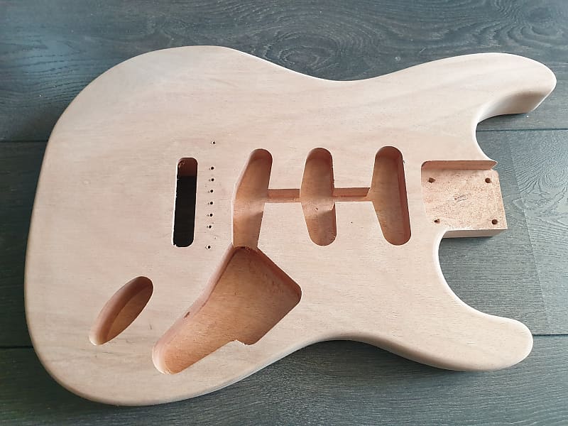 Stratocaster unfinshed natural 1 piece mahogany guitar body Reverb