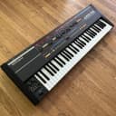 Roland Juno-106 61-Key Programmable Polyphonic Synthesizer w/ gig bag case