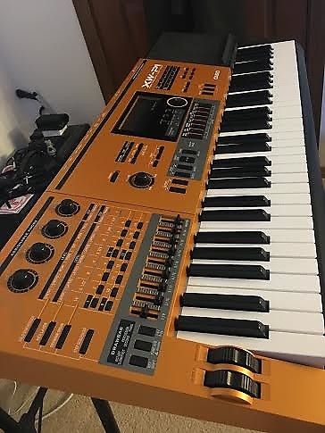 Casio new arrivals orange keyboard