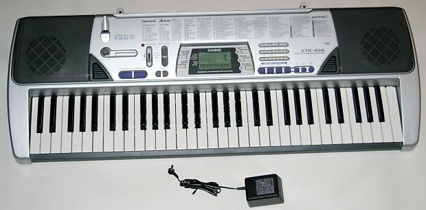 Casio CTK-496 100 Song Bank Keyboard MIDI Jacks & Mic Mix In & AC Adapter -  Silver