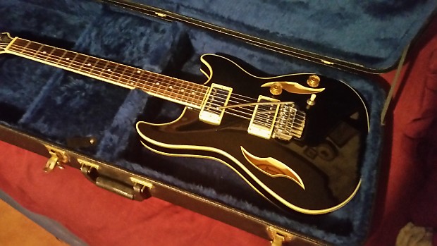 Semi hollow body guitar with floyd rose top