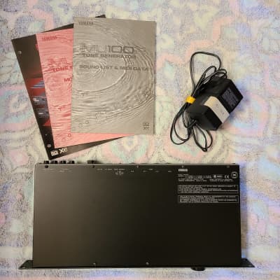Yamaha MU100R including Virtual Acoustic and Vocal Harmony boards, power supply, literature.