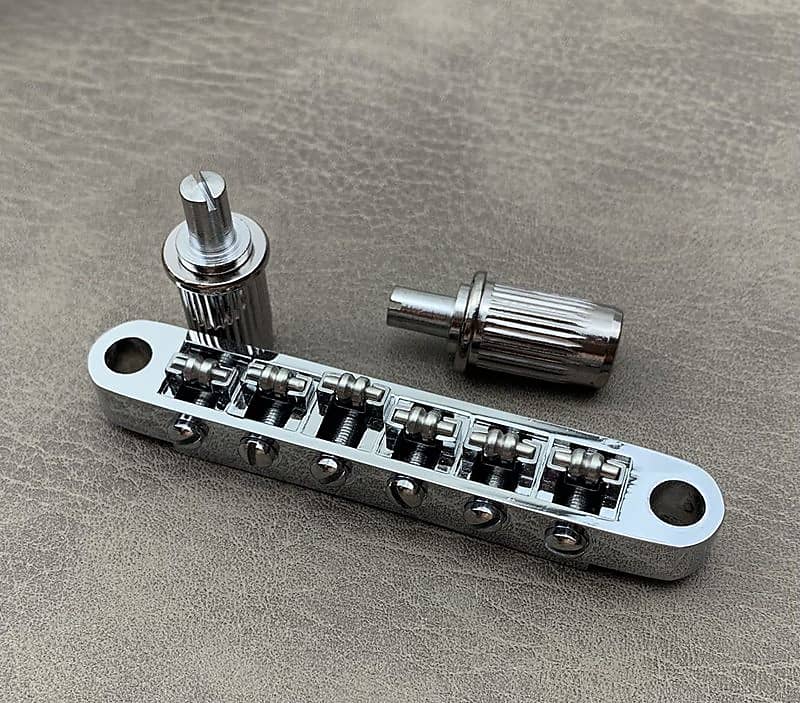 Adjustable Roller Saddle Chrome TuneOMatic Bridge For Reverb