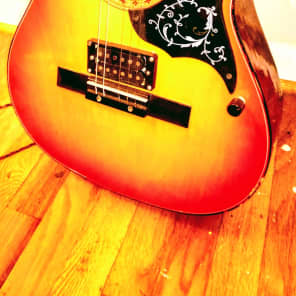 custom no name fret less  acoustic electric guitar with  a bridge mounted hum bucker image 2
