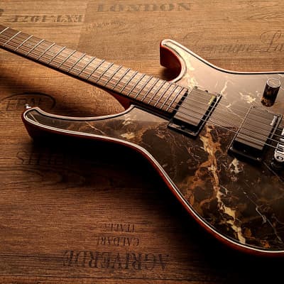 Guitarporn - This is insane! Zerberus Nemesis model with a top made of 0.2" real Black&Gold Marble image 3