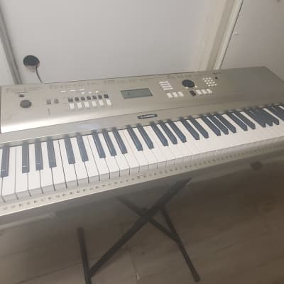 Yamaha YPG235 Portable Grand Piano 2010s - Silver (Used with some burn marks and paint chipping, but completely functional)