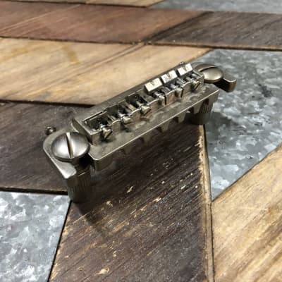 Real Life Relics Aged Nickel Badass Style Wrap Around Bridge Kit With Studs and Posts   [E7] for sale