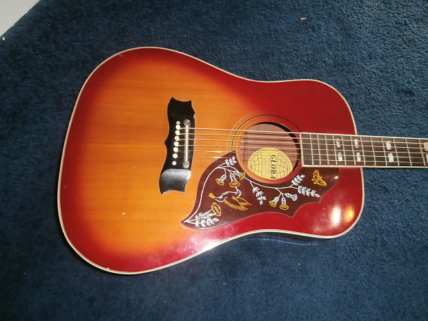 Global acoustic best sale guitar hummingbird