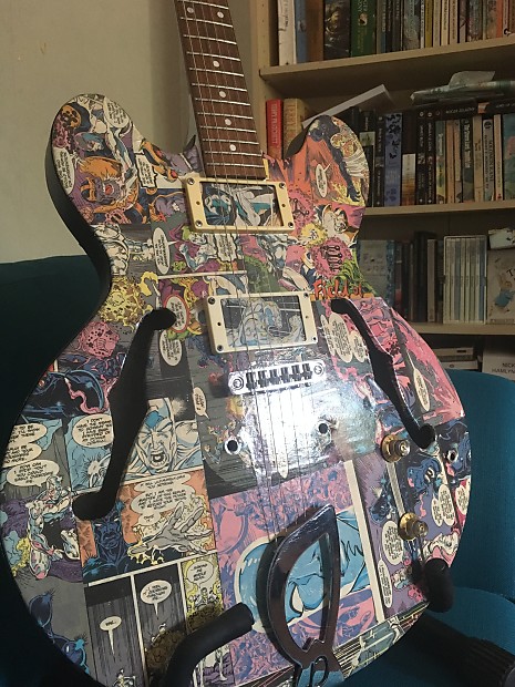 Old Antoria Guitar covered in 80's Sliver Surfer Comics, no pickups, worn frets. PROJECT image 1