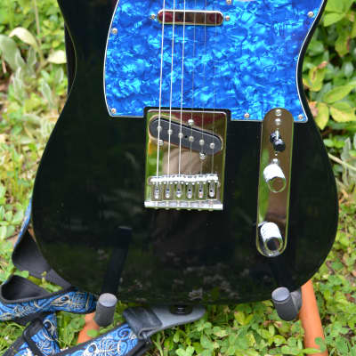 A very sharp Fender Standard Telecaster in Black w/New Blue pickguard, New Dunlop Straploks, New HSC, plus New Set up. image 1
