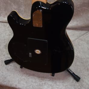 Sterling by Music Man SUB AX4 electric guitar in trans red