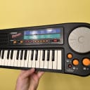 Casio rapman RAP-1 32-Key Keyboard 1990 - 1991 - Black