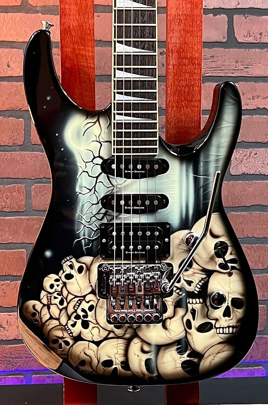 1996 Jackson DK2 Pile of Skulls Guitar, Made in Japan. HSS, Floyd, w/ Bag image 1