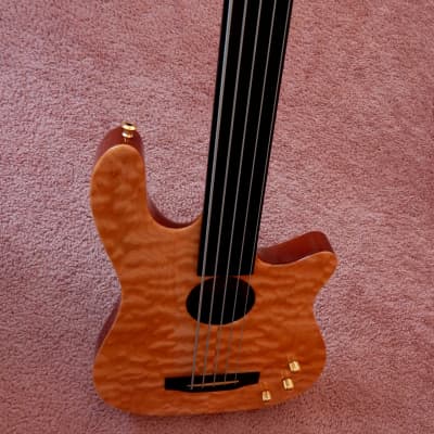 Carvin AC50 Fretless with clear, quilt maple top | Reverb