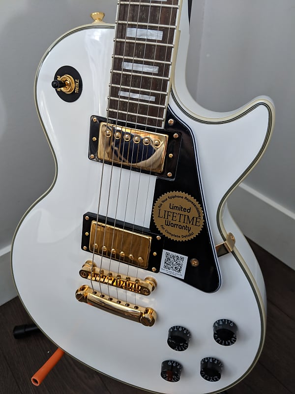Epiphone 2016 Les Paul Custom Pro I bought today. Plays and