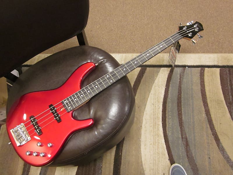 Tagima Millenium  4 electric bass 2020 in solid colors - red or black image 1