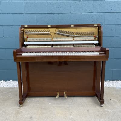 64 key upright deals piano