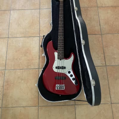 Fender American Deluxe Jazz Bass with Rosewood Fretboard 1999 Crimson Red Transparent image 3