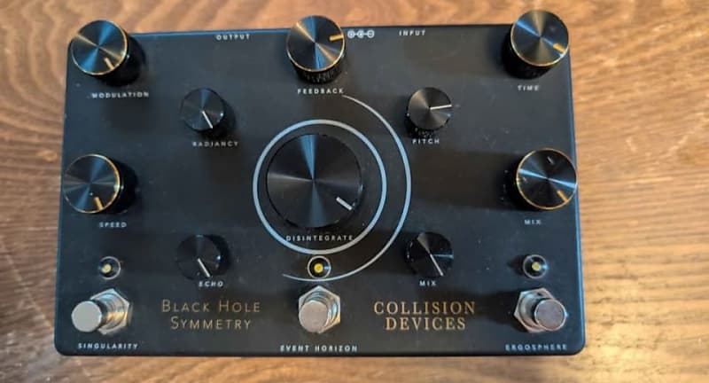 Collision Devices Black Hole Symmetry