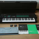 *Xmas Discount* Yamaha DX7 Perfect Condition with Case, 2 Data Cartridges, Music Stand & JP Manual