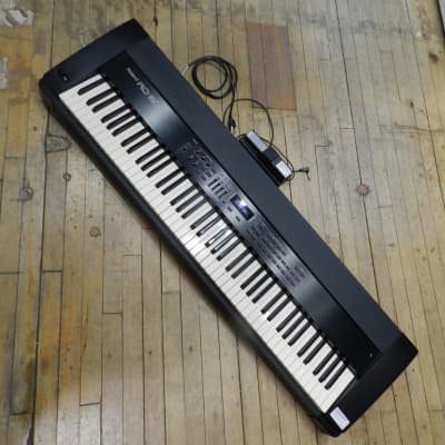 Roland RD-600 88-Key Digital Stage Piano w/Pedal.