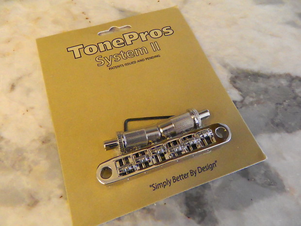 TonePros TPFR-C Metric Locking Tune-O-Matic Bridge with Roller Saddles imagen 1