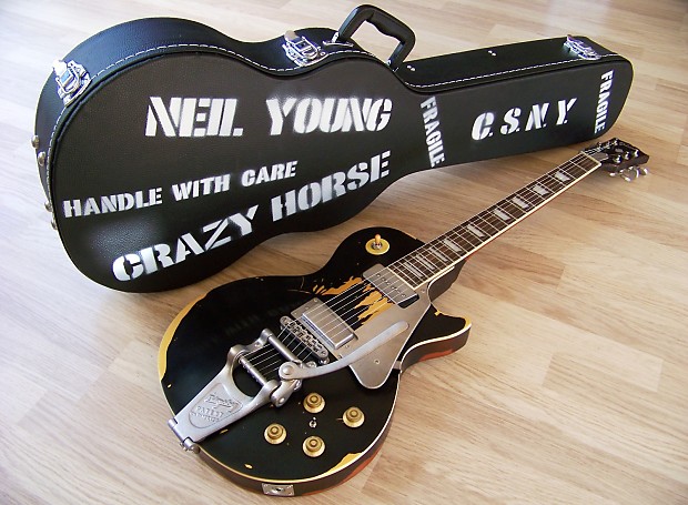 Neil young black guitar sale