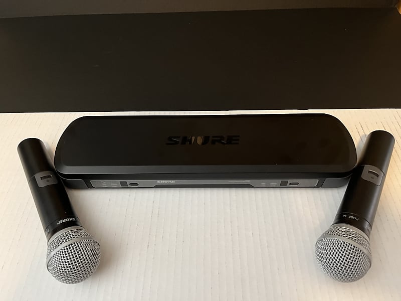 Shure pg88 receiver and 2 pg58 wireless microphones reverb