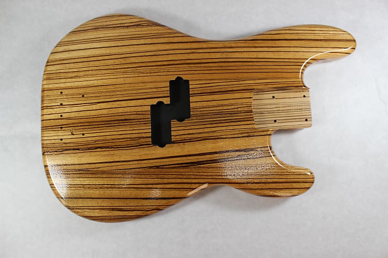 Finished Zebrawood P bass guitar body fits fender necks Reverb