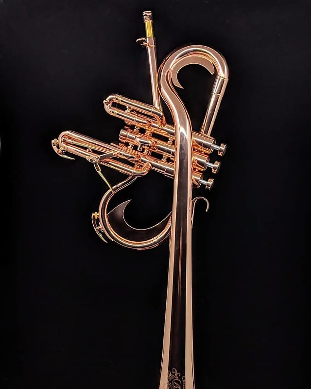 Reverse flugelhorn outlet