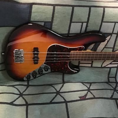1997 Fender Jazz Bass Deluxe Fretless Sunburst image 2