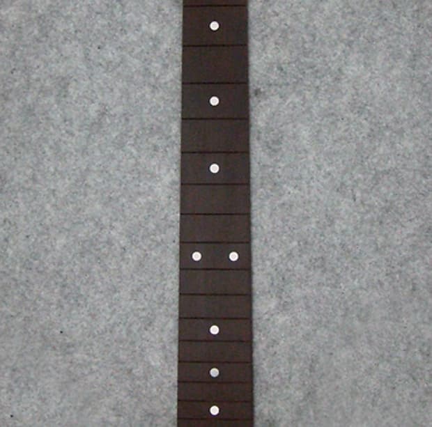 Slotted fretboard top