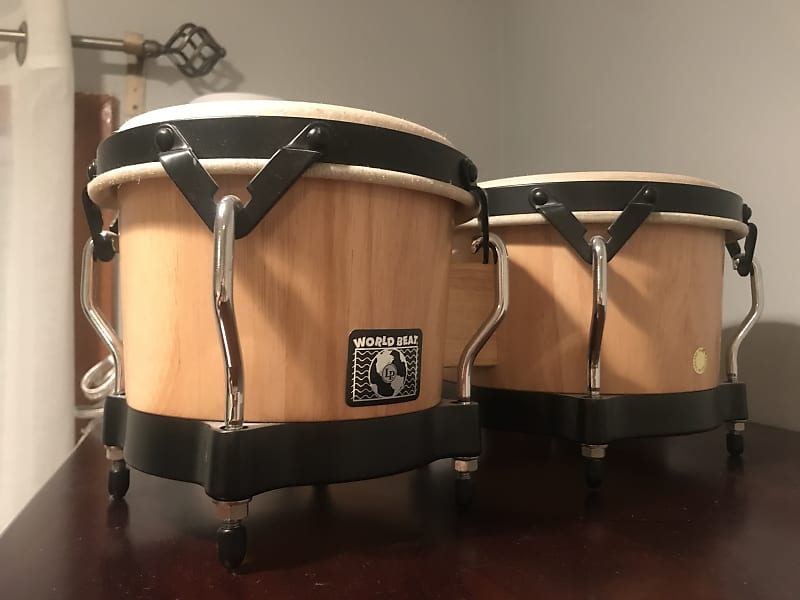 Lp World beat bongos and guirra with pick Reverb