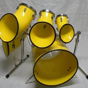 North drum set in yellow with 6'',8''10'' toms a 14'' floor tom and a 22'' bass drum with rack image 7