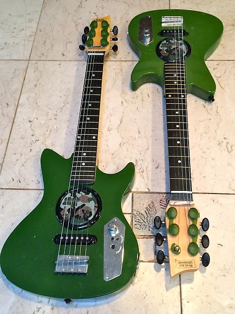 TWO First Act Discovery 2013 1 2 Size Green W Camo Built In Speaker