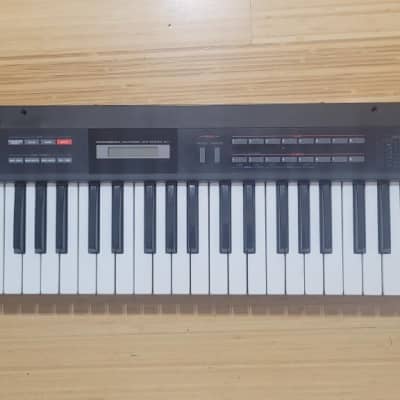 Roland Alpha Juno-1 49-Key Programmable Polyphonic Synthesizer 1985 - 1988 - Black