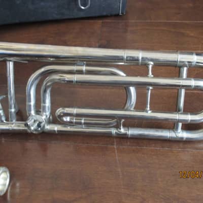 Trigger trombone with case and mouthpiece.  Silver image 8
