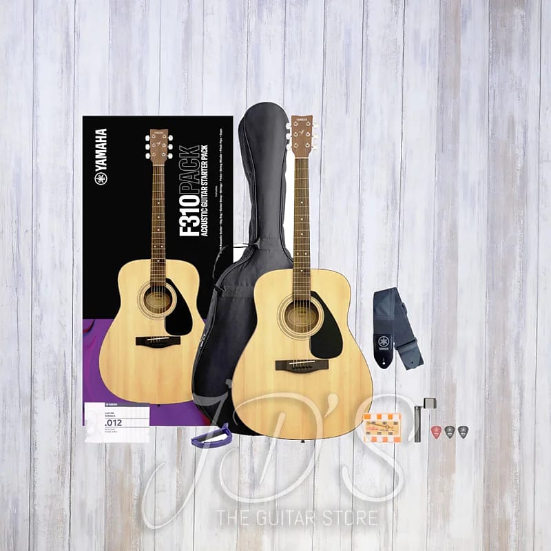 Yamaha F310 Acoustic Guitar Package Natural Pack Gig bag Strap Pitch Pipe Picks Strings String Winder and Capo 2023