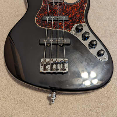 Fender American Deluxe Jazz Bass Fretless 2000 - Black w/ Tortoiseshell Pickguard image 7