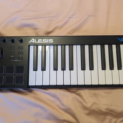 Alesis Melody 54 - Electric Keyboard Digital Piano with 54 Keys, Speakers,  300 Sounds, 300 Rhythms, 40 Songs, Microphone and Piano Lessons