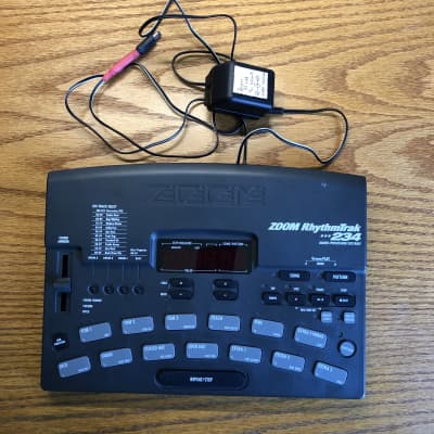 Zoom RT-234 drum machine, with transformer  power supply, cleaned and tested.
