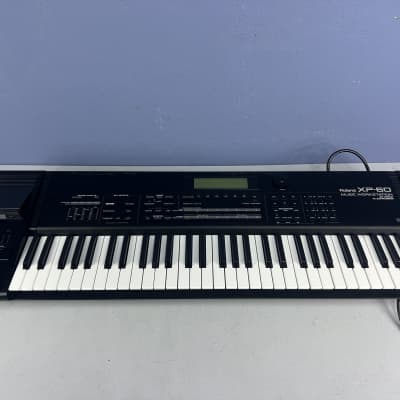 Roland XP-60 61-Key 64-Voice Music Workstation Keyboard “new battery”